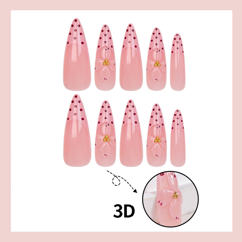 Artificial nail set with romantic flower and polka dot designs Stornfield