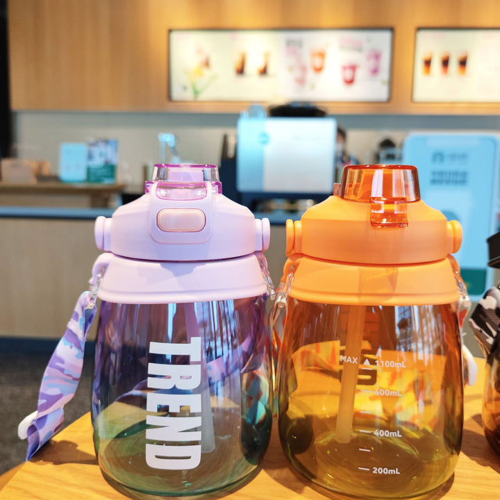 Women's multifunctional water bottle with safety closure and ergonomic carrying handle Stornfield