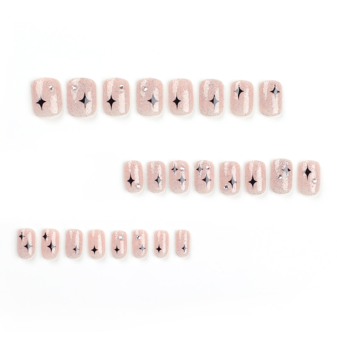 Artful Nail Extensions with Glitter and Star Pattern Stornfield