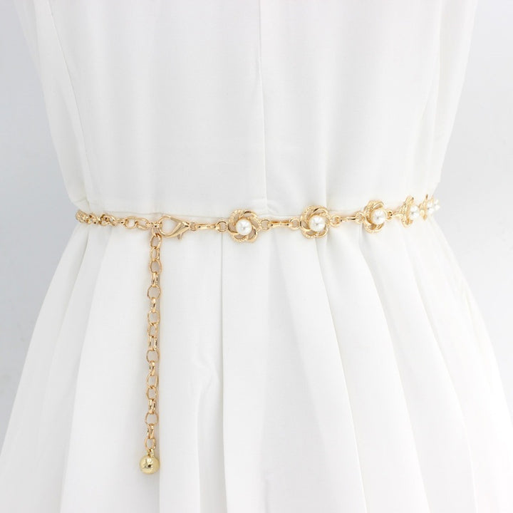 More elegant chain belt with pearl details Stornfield