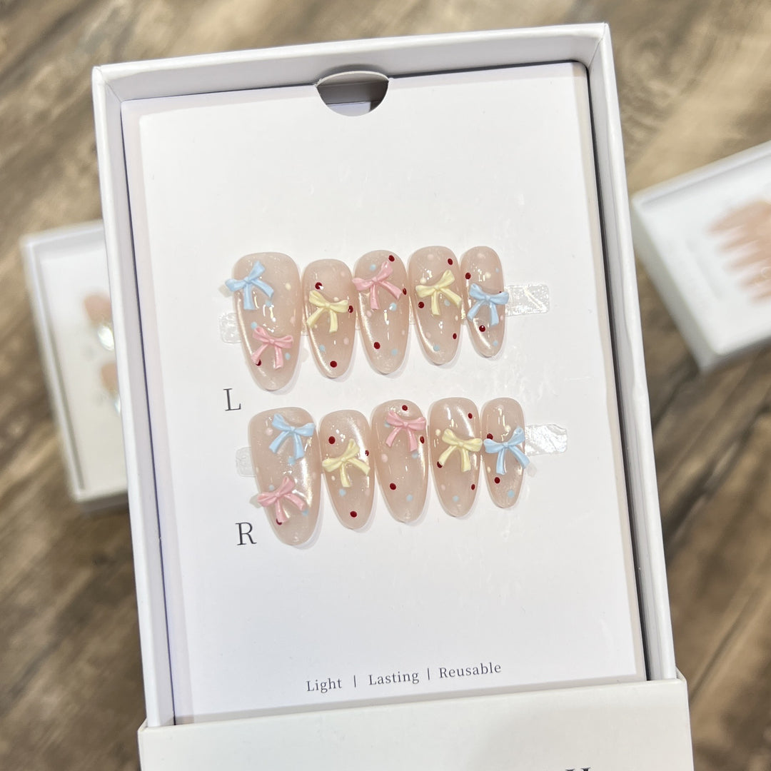Decorative Press-On Nail Set with Charming Bow and Dots Stornfield