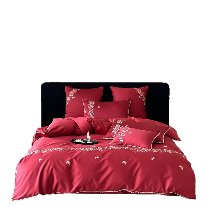Elegant satin bedding set with fine floral embroidery and reversible design