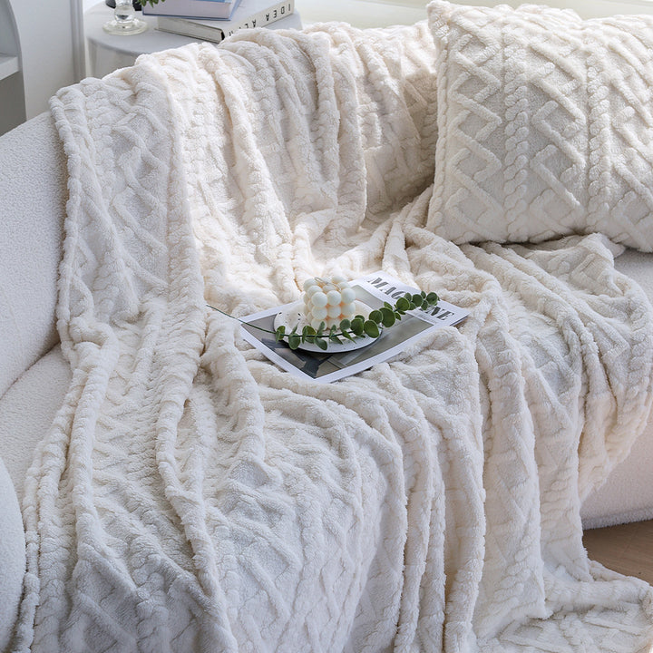 Cuddle blanket with textured surface