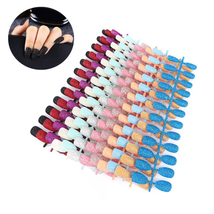 Glamorous artificial nails with sparkling glitter Stornfield