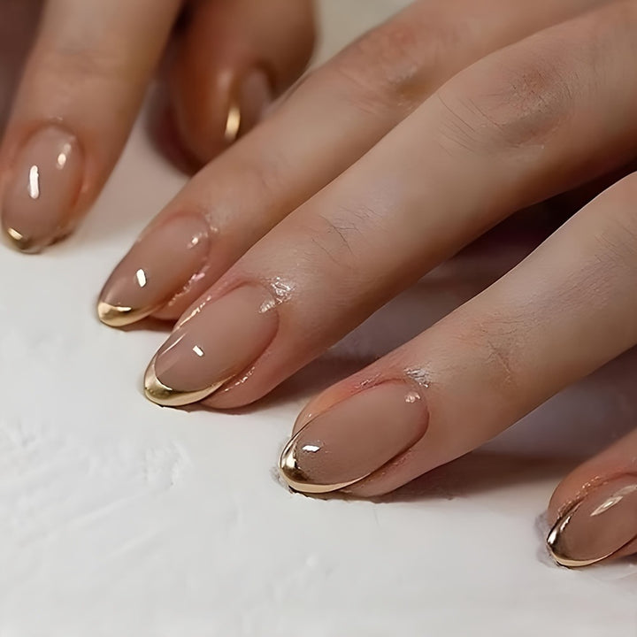 Artificial nails with elegant gold French tip Stornfield