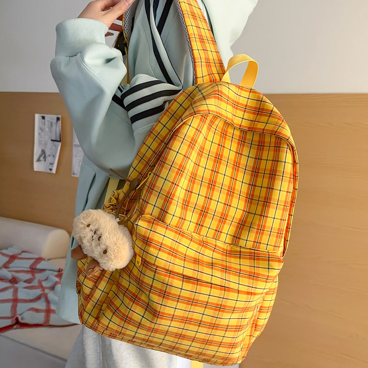 Backpack with Practical Check Pattern and Cute Plush Pendant Stornfield