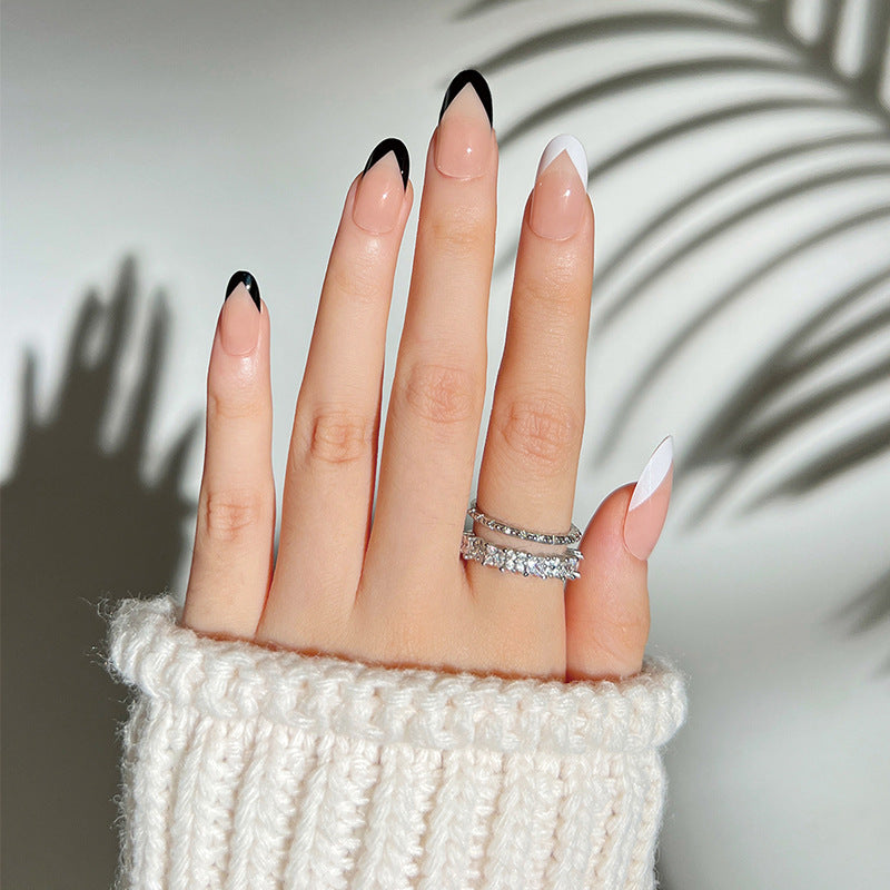 Artificial stiletto nails with elegant design and glamour embellishments Stornfield