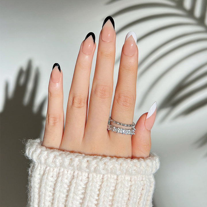 Artificial stiletto nails with elegant design and glamour embellishments Stornfield