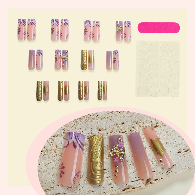 Artistic Nail Art Set with Elegant Floral and Gemstone Accents Stornfield
