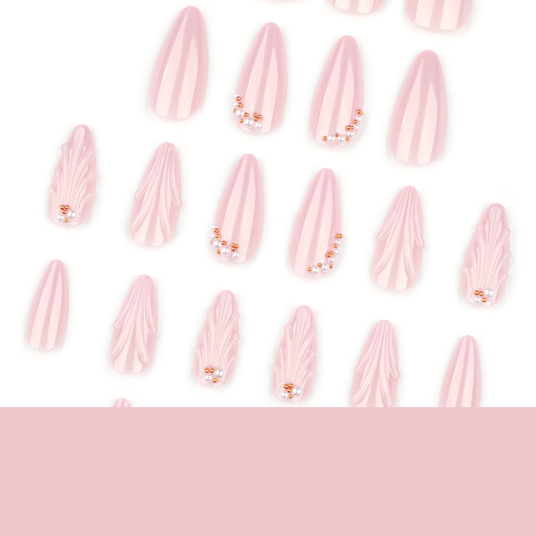 Elegant stiletto nails with shimmer design and pearl decorations Stornfield