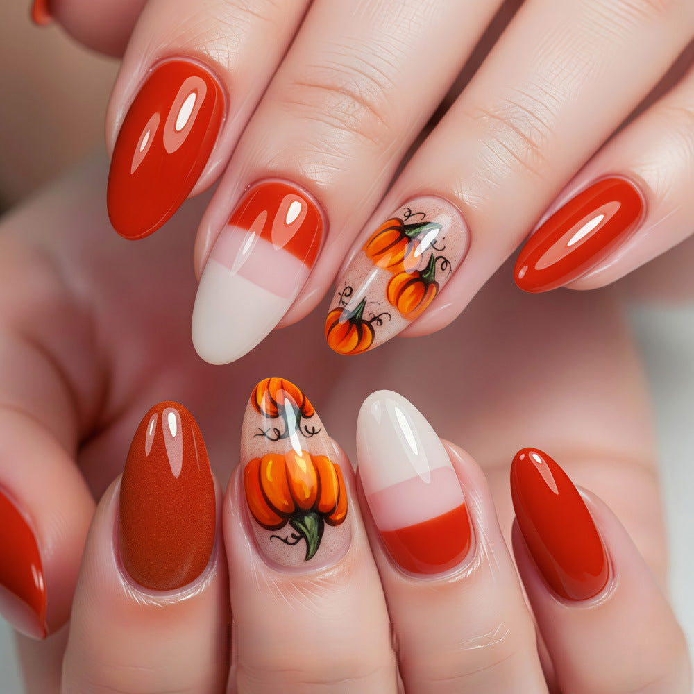 Artificial nails in autumn pumpkin design Stornfield