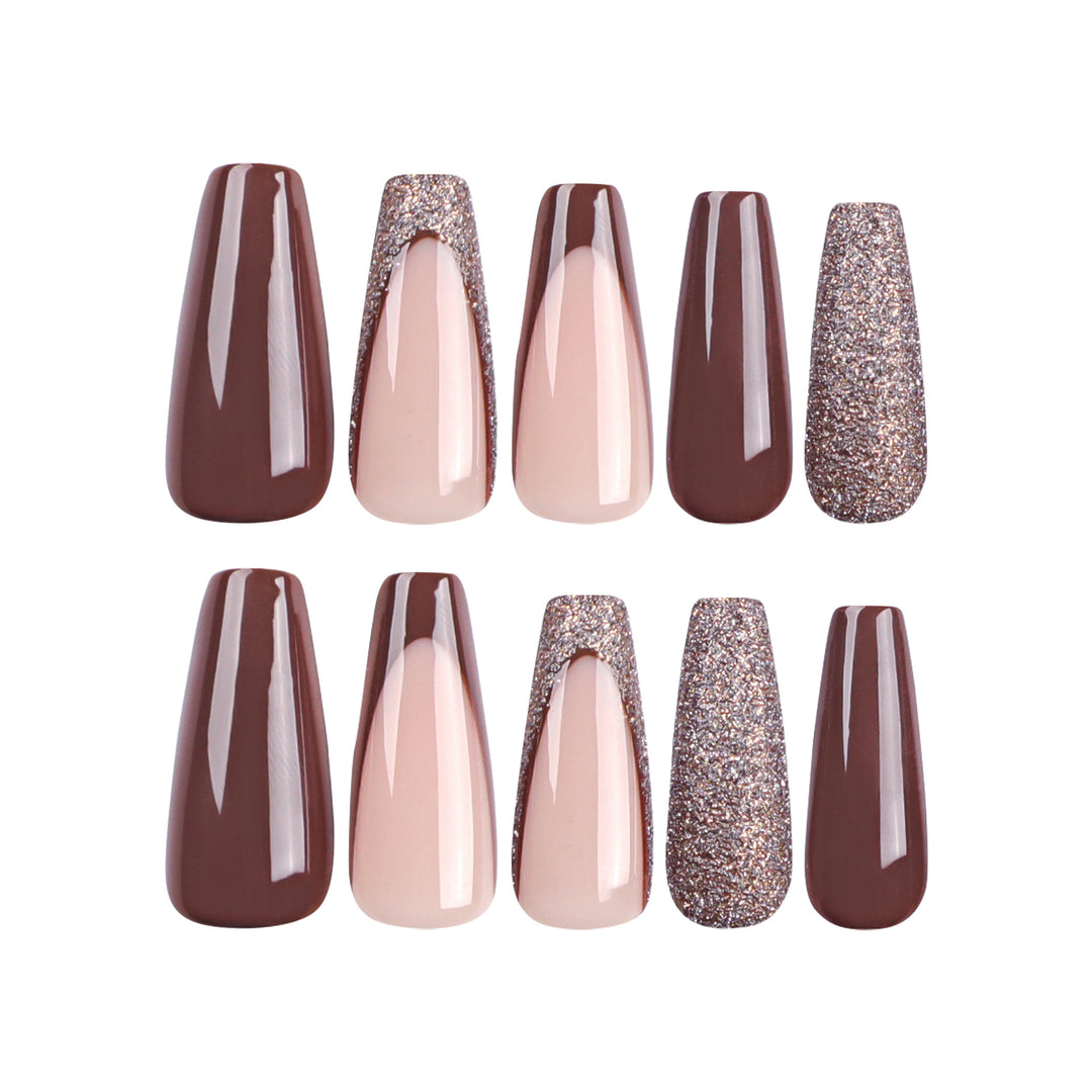 Artful stiletto nails with glitter embellishments Stornfield