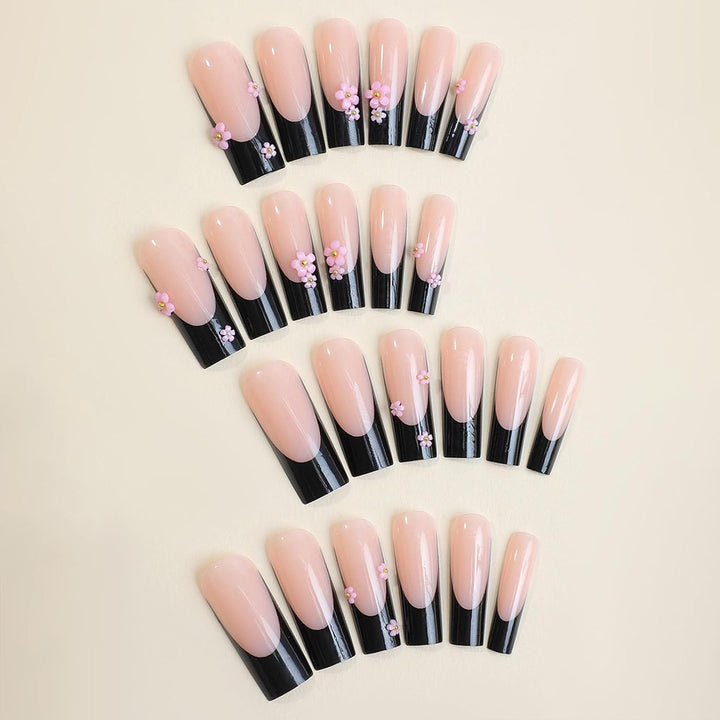 Artificial nail set with elegant flower applications Stornfield