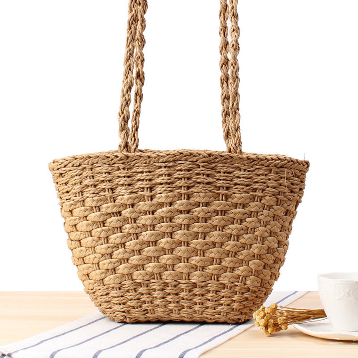 Braided handbag made of natural raffia with robust carrying straps Stornfield