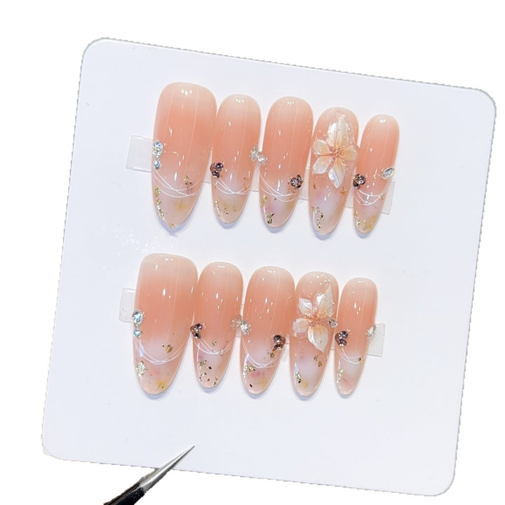 Artificial nails with delicate flower and glitter detail Stornfield