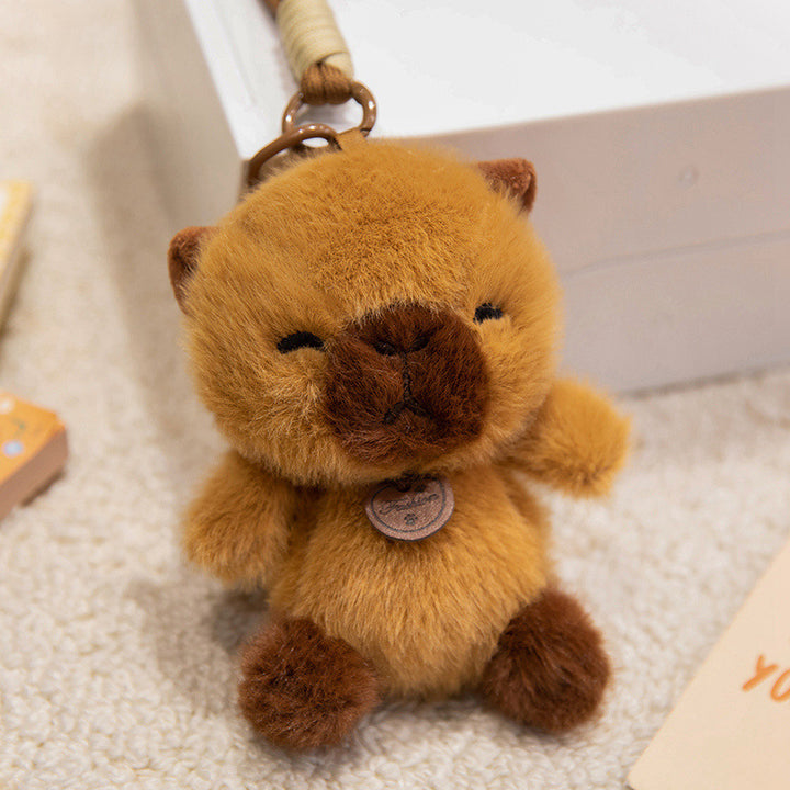 Plush Sitting Piglet Comforter Toy with Embroidered Paw Charm and Pendant Stornfield