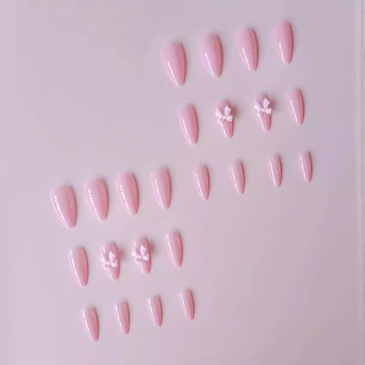 Artificial nails with elegant bow accents Stornfield