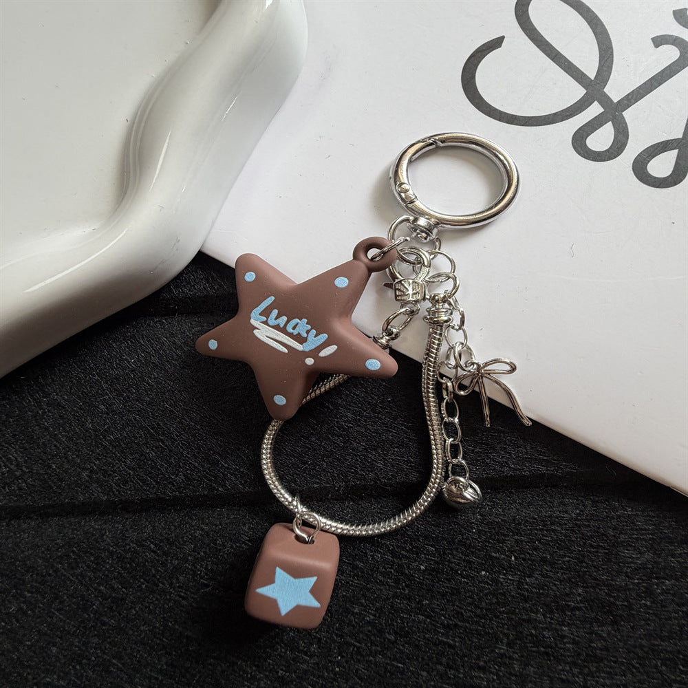 Playful Star-Themed Key Charm Stornfield