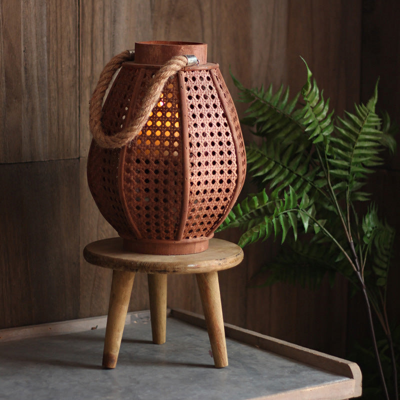 Decorative lantern holder made of natural material Stornfield