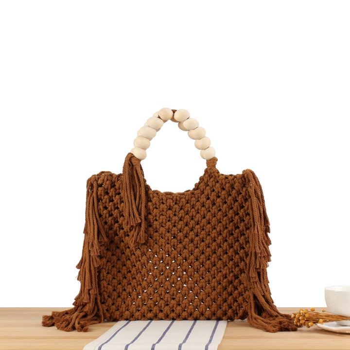 Creative crochet handbag with decorative fringes Stornfield