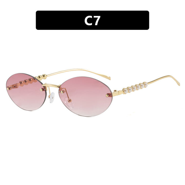 Women's stylish oval sunglasses with elegant embellishments Stornfield