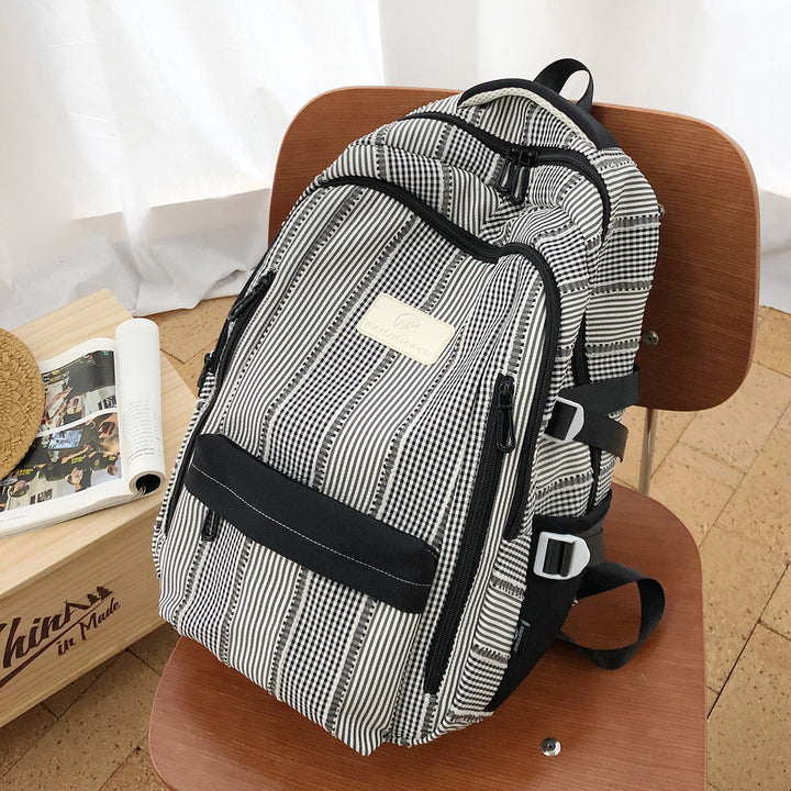 Striped Backpack with Keychain Charm Stornfield