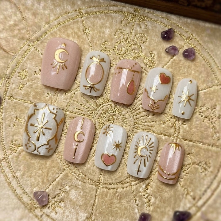 Artistic Press-On Nails Set with Celestial Designs