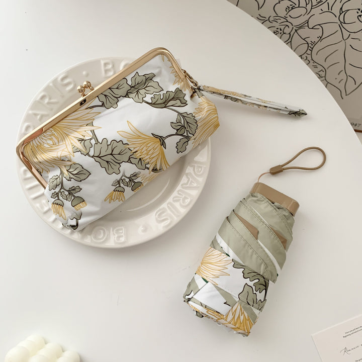 Ladies elegant folding umbrella with floral design and practical case Stornfield