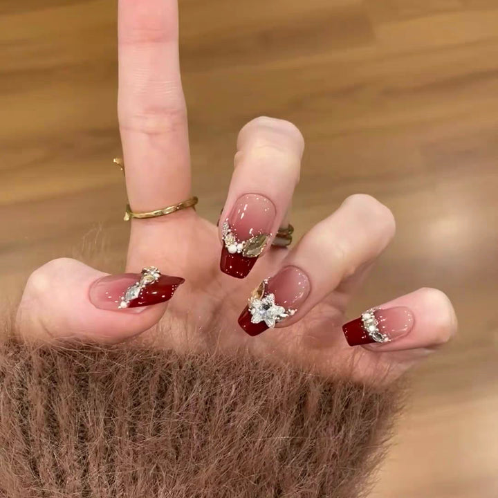 Artistic Press-On Nail Design with Gemstone Accents Stornfield