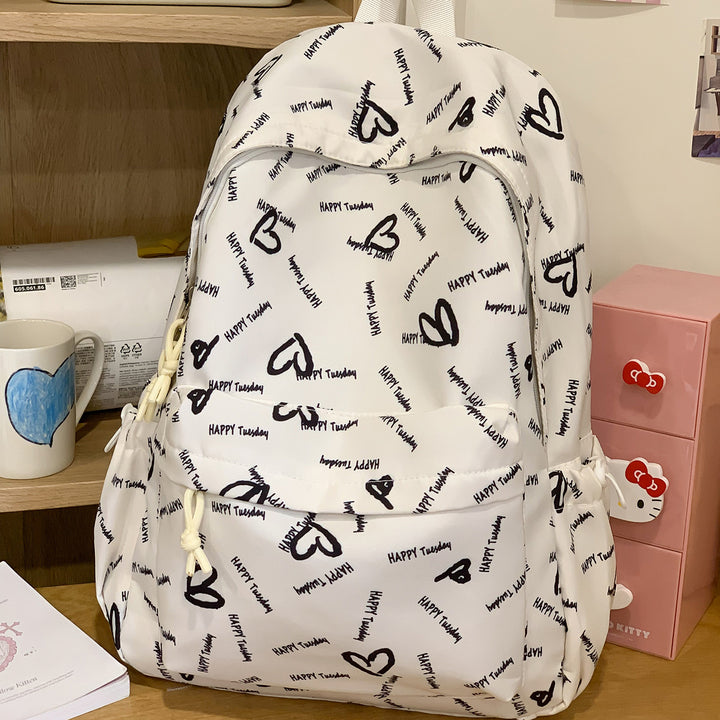 Playful Heart-Patterned Backpack Stornfield