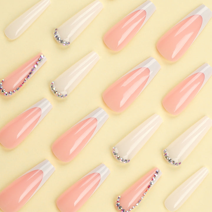 Artful nail extensions with rhinestone embellished accents Stornfield