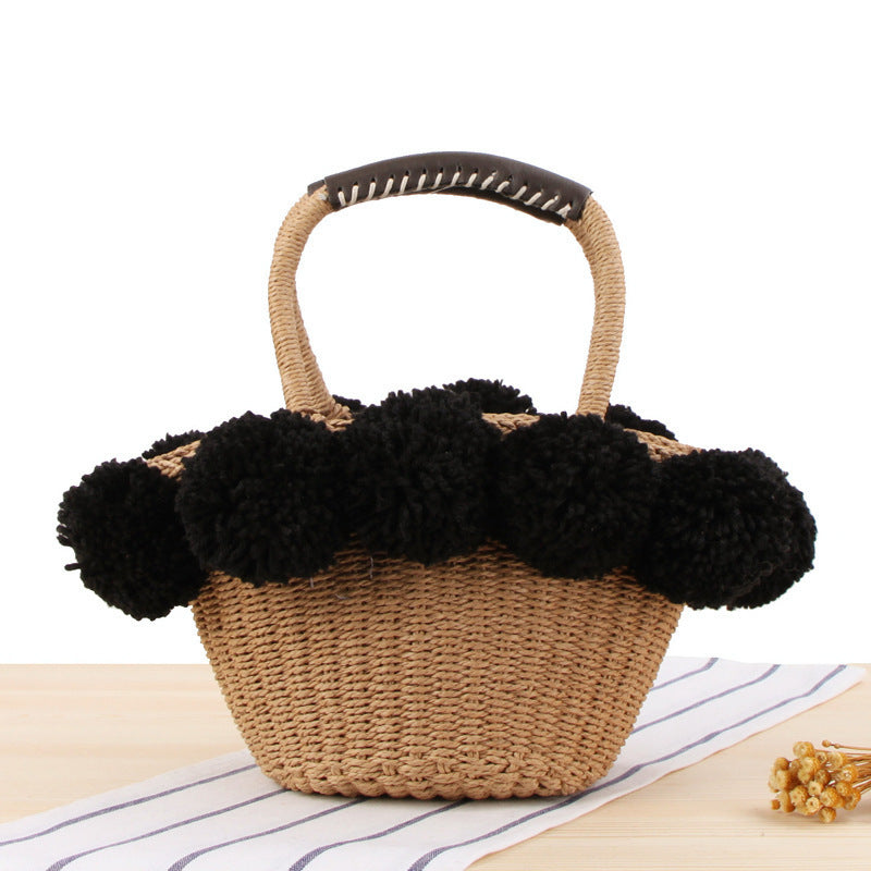 Basket bag with decorative pompons Stornfield