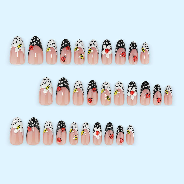 Artificial nails with playful insect design Stornfield