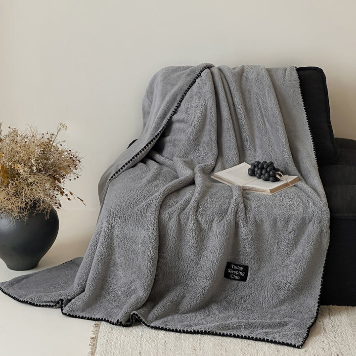 Extra soft microfleece throw blanket with decorative stitching