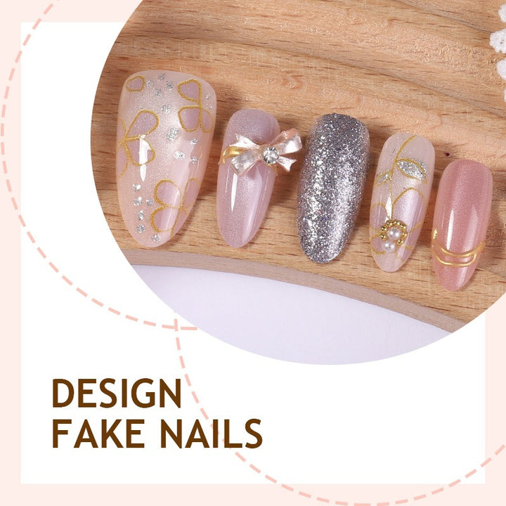 Artificial nail set with decorative flower and glitter embellishments Stornfield