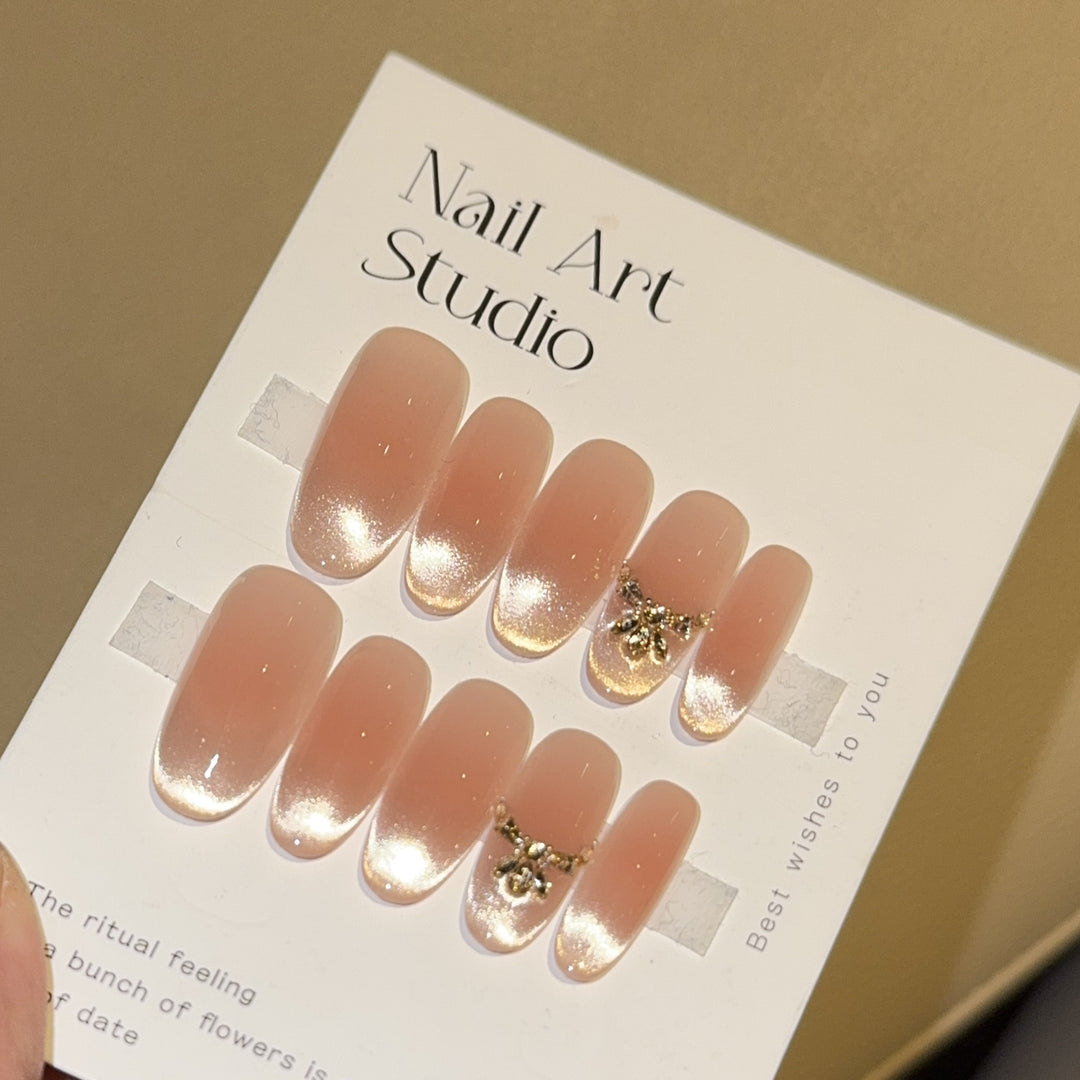 Artificial nails with elegant tip design and gold accents Stornfield