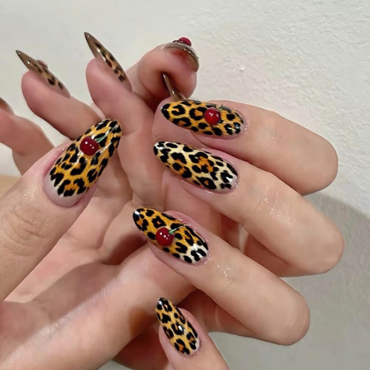Artful stiletto nails with leopard pattern and accents Stornfield