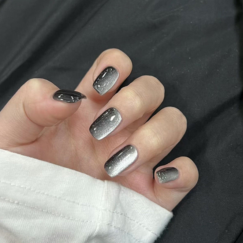Artifical nail set with glamorous ombre effect and glitter embellishments Stornfield