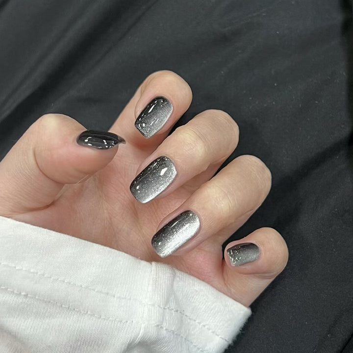 Artifical nail set with glamorous ombre effect and glitter embellishments Stornfield