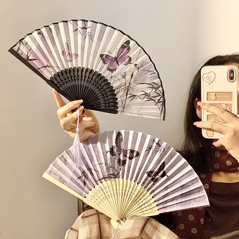 Elegant fan with elaborate butterfly motif Stornfield