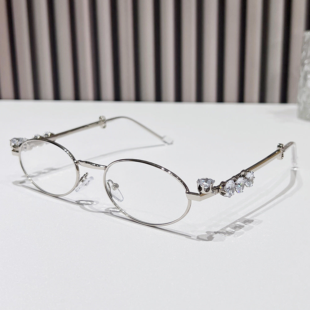 Fashion-Forward Oval Sunglasses with Crystal Accents Stornfield