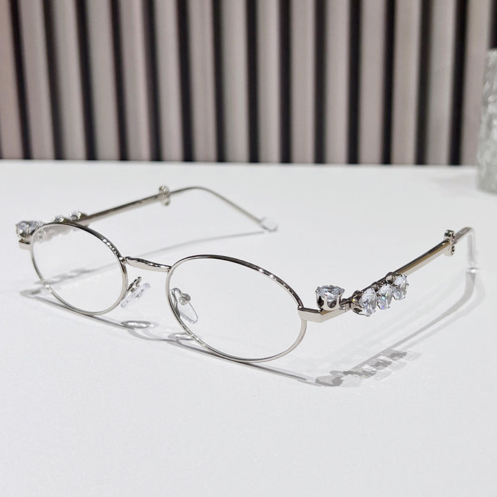 Fashion-Forward Oval Sunglasses with Crystal Accents Stornfield