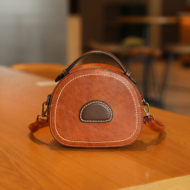 Vintage-Inspired Round Crossbody Bag