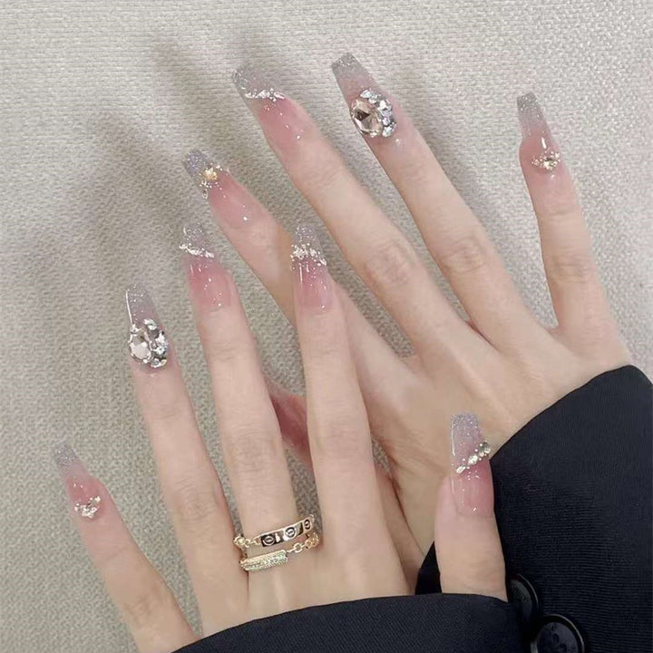Elegant artificial nails with sparkling gold accents Stornfield