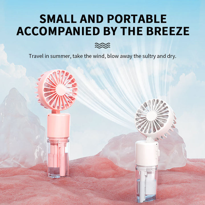 Cooling compact rechargeable folding misting handheld fan with transparent water reservoir detachable base and four speed brushless motor Stornfield