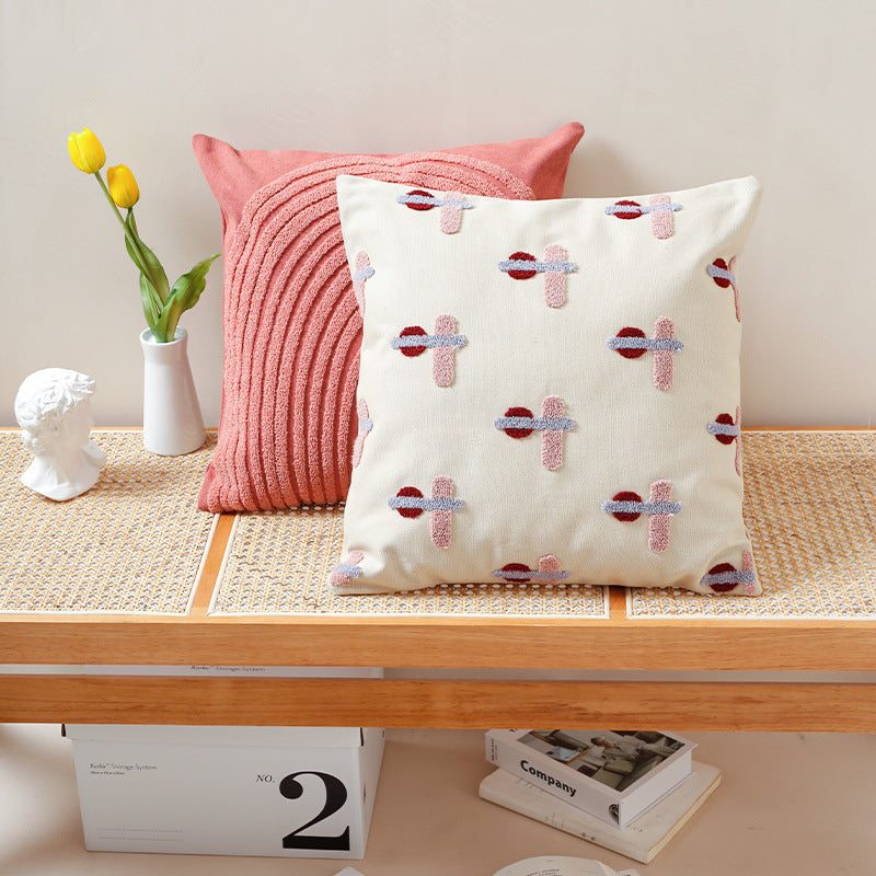 Square cushion cover with hand-tufted geometric applications
