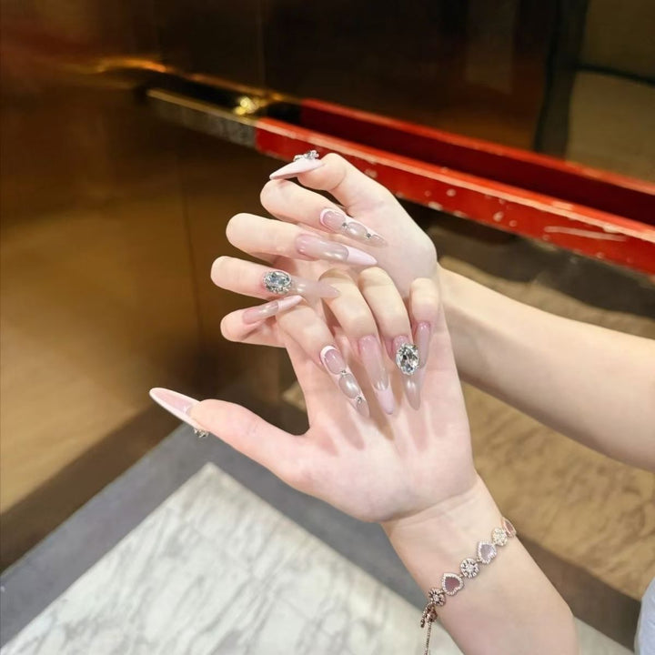 Glamorous Stiletto Nail Art Extensions with Crystal Accents