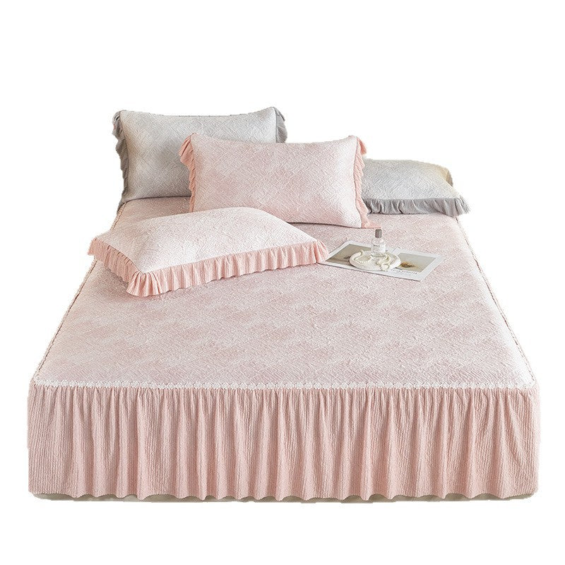Reversible mattress protector with pleated ruffle and microfiber velvet surface