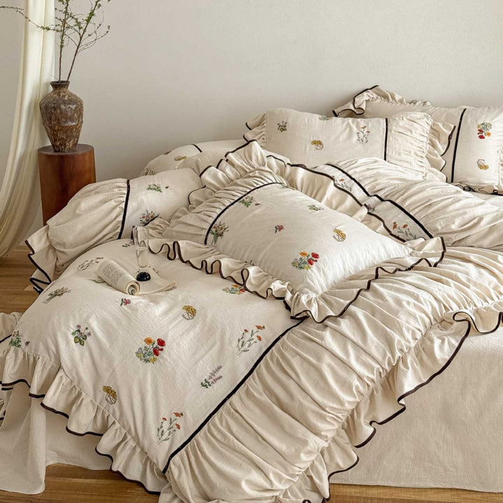 High-quality bed linen set made of linen-cotton blend with wildflower embroidery and ruffled hem