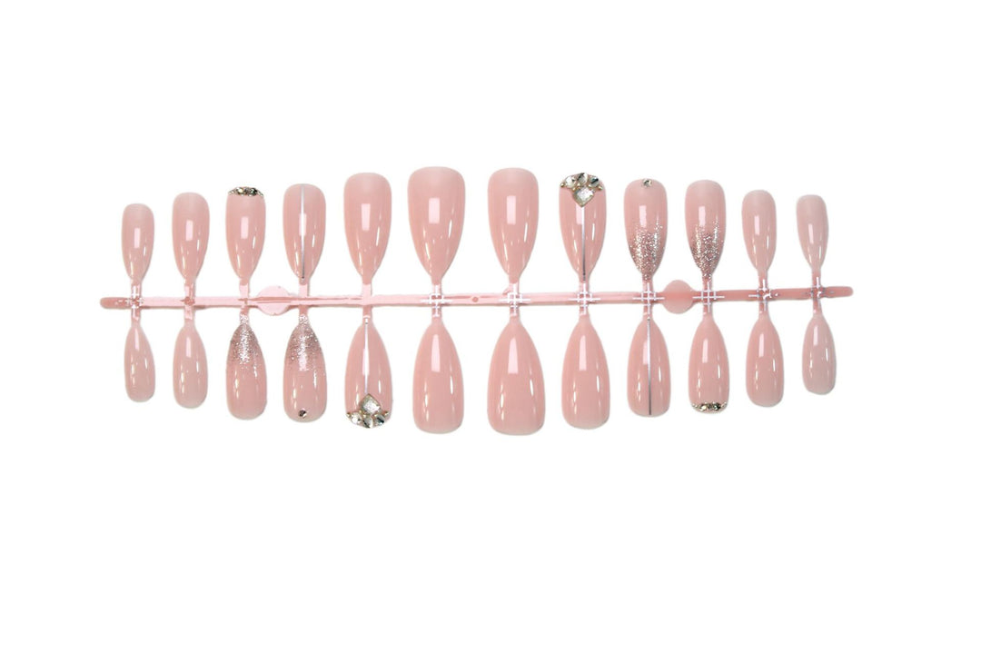 Glamorous artificial nails with rhinestone accents and shimmering effects Stornfield